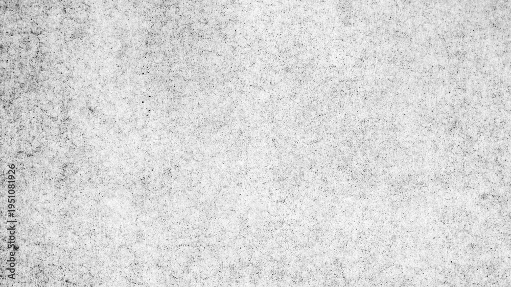 Obraz premium Subtle grunge paper texture with fine noise and scan grain on real page surface. Analog macro paper background.