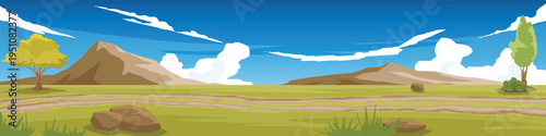 Horizontal or Landscape of dirt road cutting through a vast grassland. With trees on two side of picture. Mountains under blue sky and white clouds. For rally racing or rural road races.