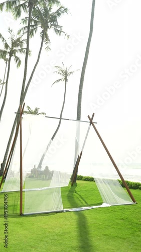 Oceanfront beach club in Sri Lanka, summer vacation destination with chill lounge, palm trees and scenic coastline