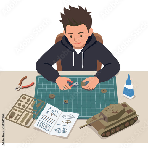 A man assembles a model tank on a worktable with tools and instructions.