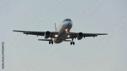 Passenger Airplane Landing At Sydney Airport During Sunset Australia