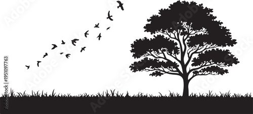 Silhouette of birds flying towards a solitary tree in a serene landscape.