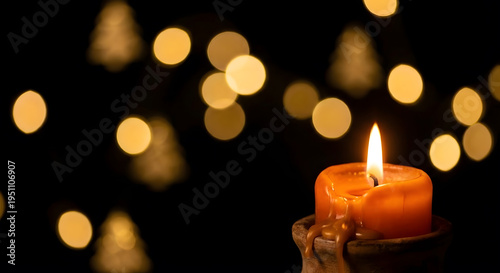 Warm Glow of Candlelight with Festive Bokeh Lights in the Background