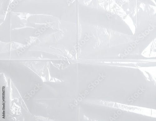 Abstract close-up of a crinkled, translucent white plastic sheet