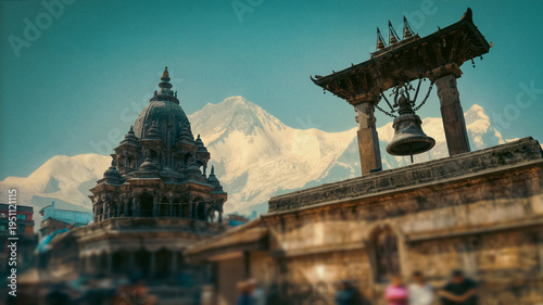 Ancient Patan Durbar Square Temples with Snowy Himalayas Background with copy space