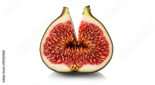 A halved fig showcasing its vibrant red and orange pulp and seeds