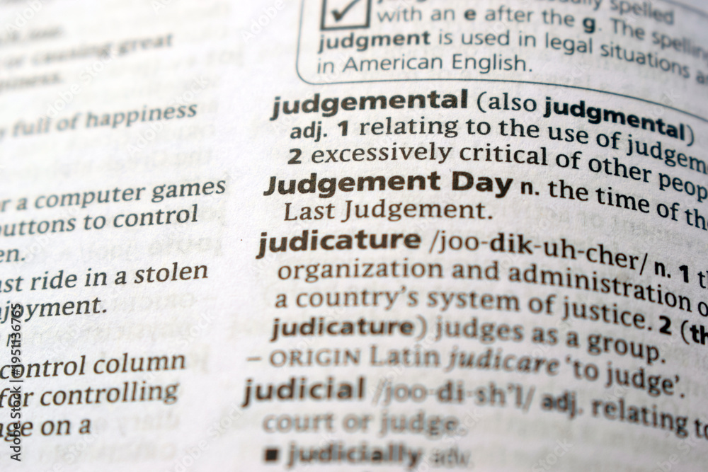 Fototapeta premium Detail Of English Dictionary Page And Word Pronunciation Of - judgemental
