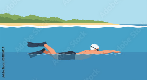 Swimmer with goggles and fins glides through calm blue water near a sandy beach