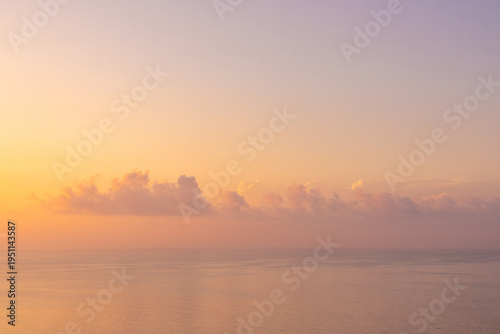 Beautiful and Romantic Sunrise Morning Glow Over the Sea
