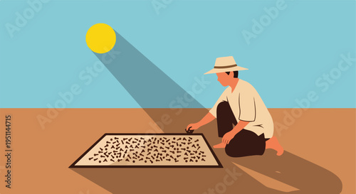 A person in a hat spreads crops under the sun to dry