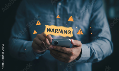 Mobile phone user receiving warning notification alerts on smartphone screen