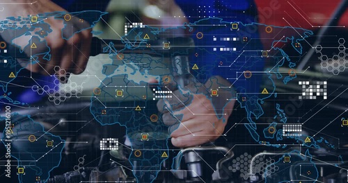 Auto tech placing socket then turning ratchet while faint world map HUD overlaying bay, guiding fix