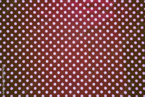 Purple fabric texture with white polka dot pattern background