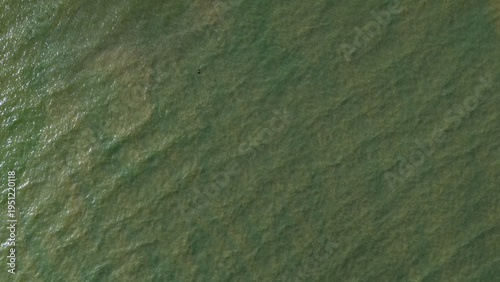 Top down aerial turquoise sea water texture