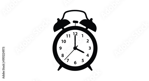Black silhouette of a classic alarm clock displaying ten o clock