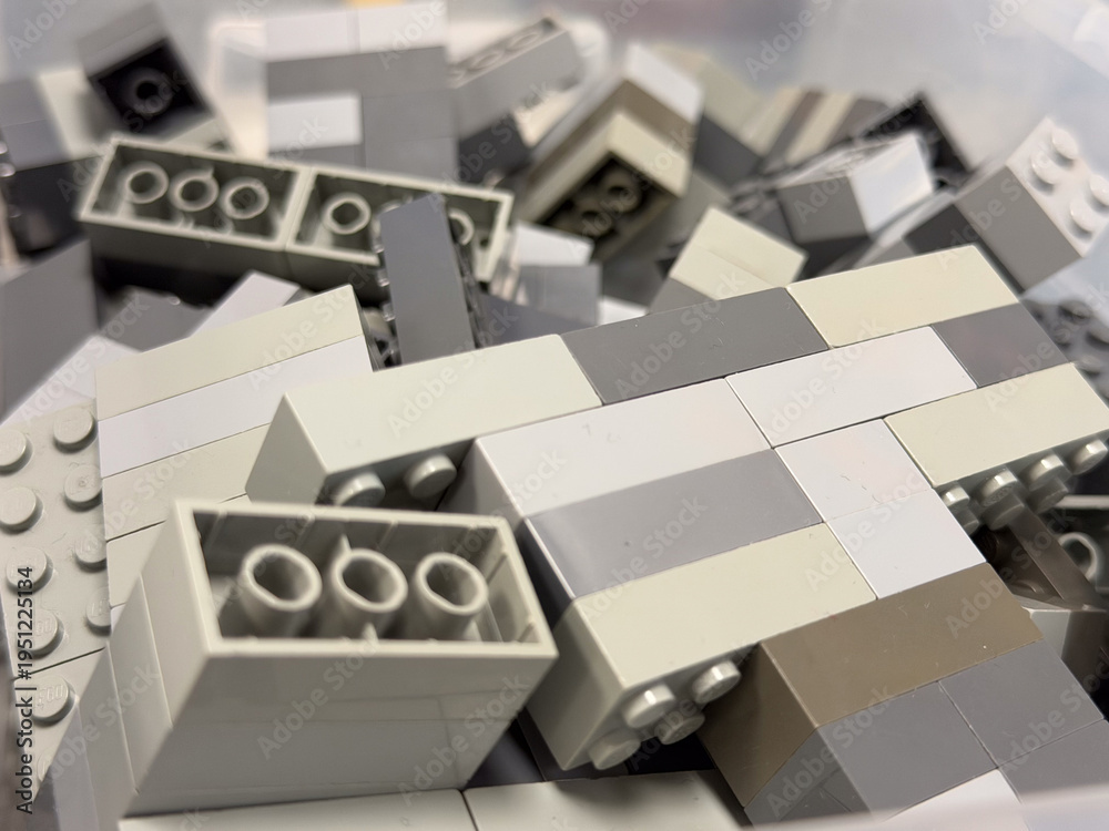 Fototapeta premium Grey and white building blocks close-up