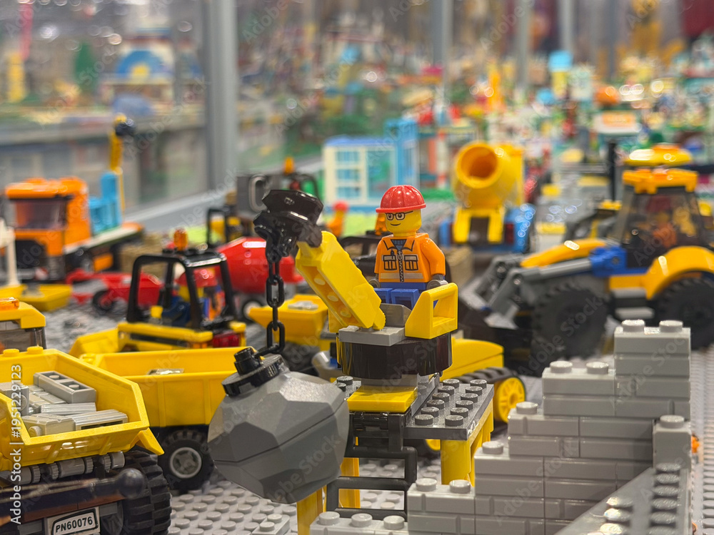 Naklejka premium Lego construction site with minifigure and wrecking ball