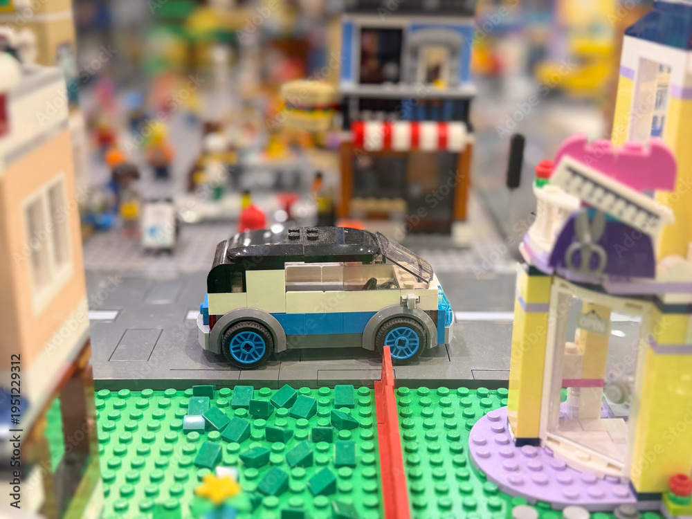 Fototapeta premium Lego toy car on city street