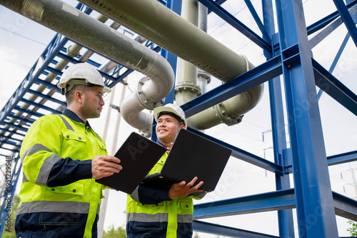 Expert engineers are collaborating to investigate for abnormalities in the gas pipeline system of a large industrial plant.