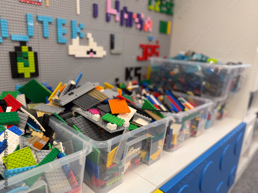 Fototapeta premium Bins of colorful lego plates and bricks