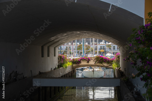 Romantic canal with flowers and bridge in Puerto de Mogán, Gran Canaria