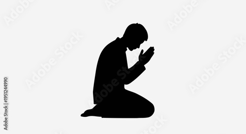 Man Kneeling in Prayer Silhouette.