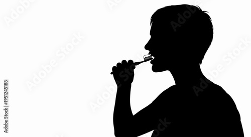 Silhouette of a person brushing teeth.