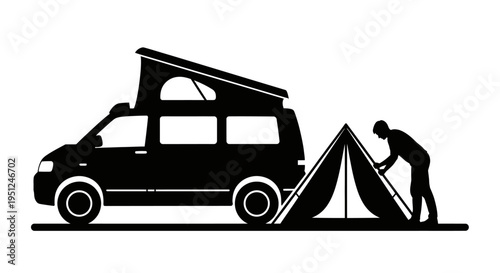 Man setting up a tent next to van.