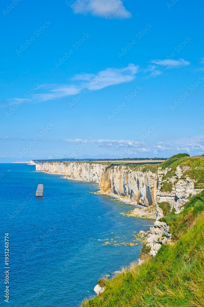 Fototapeta premium Scenic Coastal Cliffs Overlooking Azure Waters in Summer