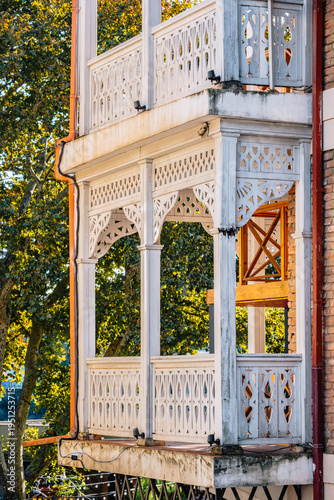 Traditional Gerogian house with wooden carved balcony in the city of Kutaisi, Georgia