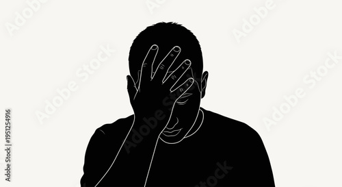 Man covering face with hand gesture.