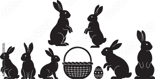 Black silhouettes of several rabbits and a woven basket with an egg silhouette