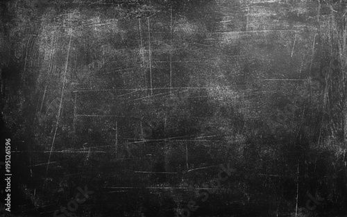 Abstract traces of rubbed out chalk on blackboard. Blackboard with space to add text or graphic design.