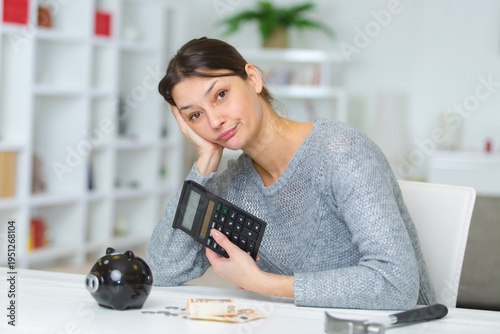 Tableau sur toile sad woman reading documents at her home