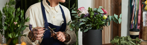 Принти на полотні Creative florist arranging vibrant flowers in a cheerful small business setting