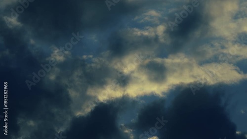 4K 59,94 fps Dark Stormy Clouds Drifting Right with Golden Undertones