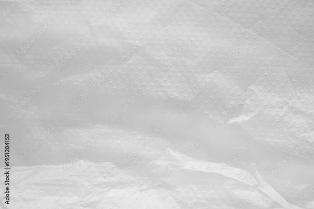 Obraz premium Crumpled White Plastic Sheet Texture Background