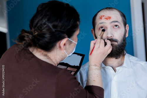 Εκτύπωση καμβά People behind the scenes getting prepared for horror movie shooting