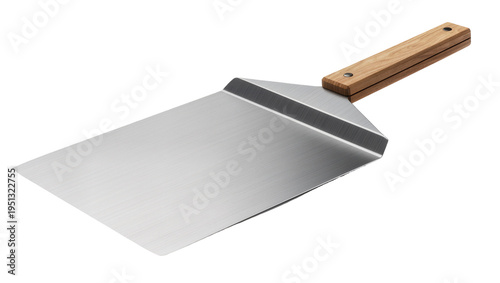 Konstfotografi Isolated professional kitchen spatula with a metal blade and a wooden handle for