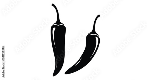 Two black chili peppers displayed elegantly in a bold silhouette