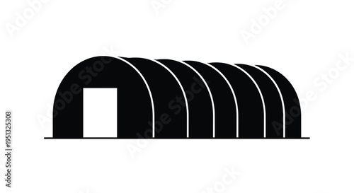 Simple black arched structure with an open doorway a stark silhouette