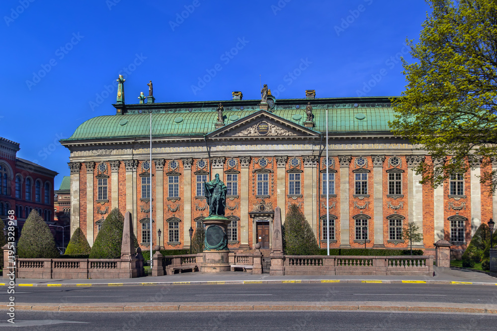 Obraz premium House of Nobility in Stockholm, Sweden. Historic brick building of Riddarhuset under a clear blue sky in sunny April.