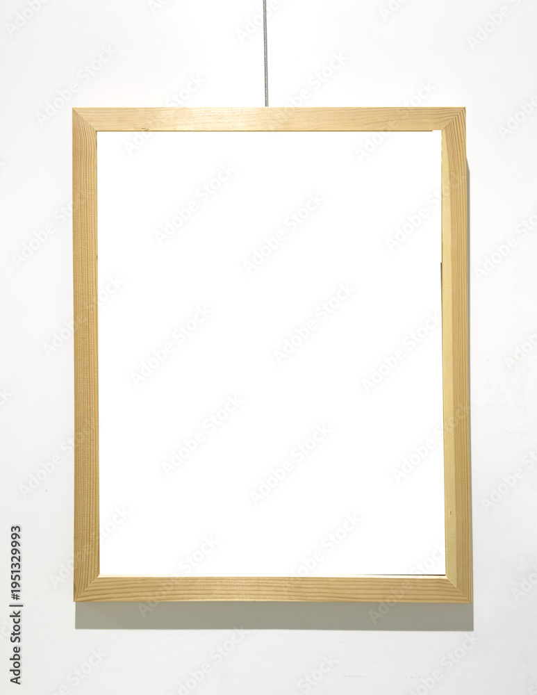 Obraz premium Golden frame hangs on string with empty interior space. Suspended border encloses blank area ready artwork insertion mockup.