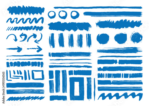 Collection of blue brush strokes and shapes on a white background