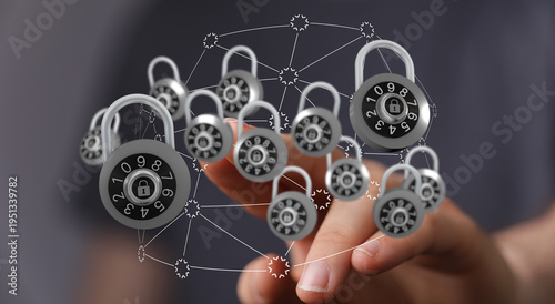 Fotografia Hand touching digital padlocks representing network security, data protection, and online safety