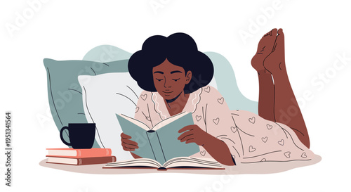 Young woman relaxing in bed while reading a book with a stack of other books and a cup of coffee nearby for comfort.