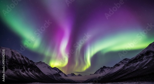 Vibrant Aurora Borealis Illuminates Snowy Mountain Landscape at Night.