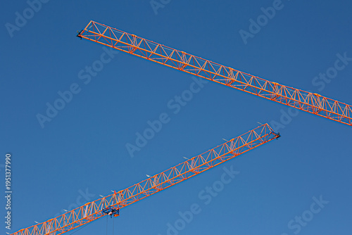 Photos two cross constriction cranes