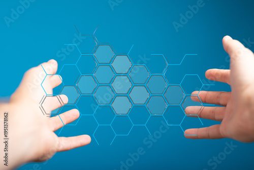 Abstract image of hands int...