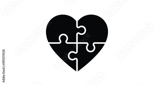 Four puzzle pieces forming a heart shape a striking black silhouette